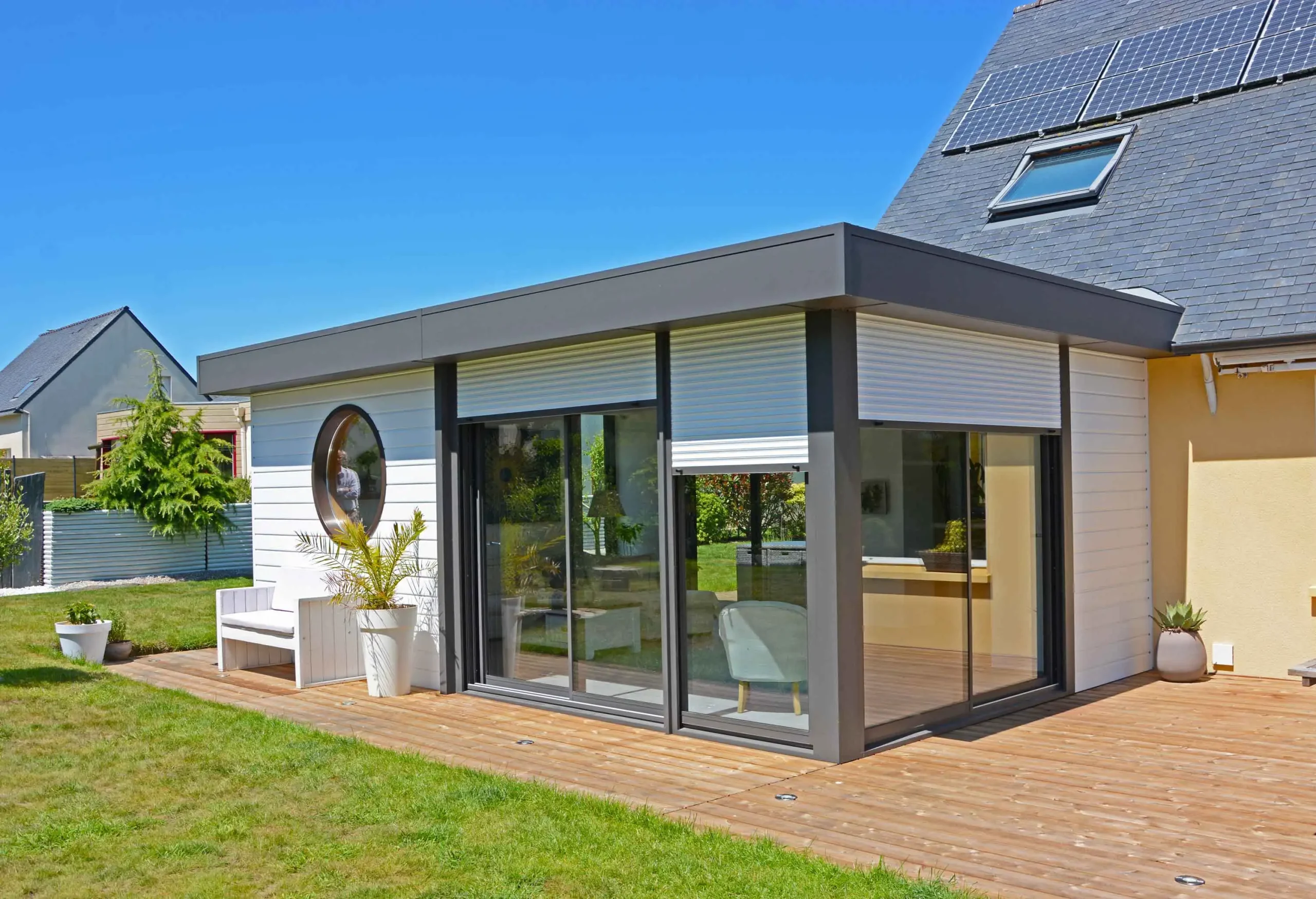 Extension de maison toiture terrasse œil de bœuf